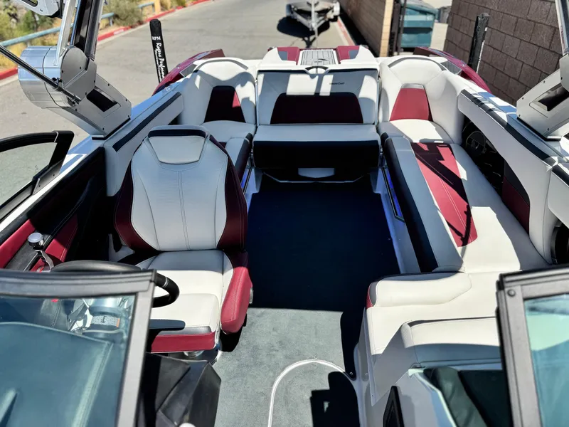 Slide: The Image of 2022 MasterCraft XStar S interior with white and red seating, modern design. - 22