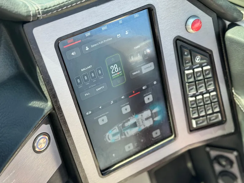 Slide: The Image of 2022 MasterCraft XStar S touchscreen control panel with ballast and cruise settings. - 43