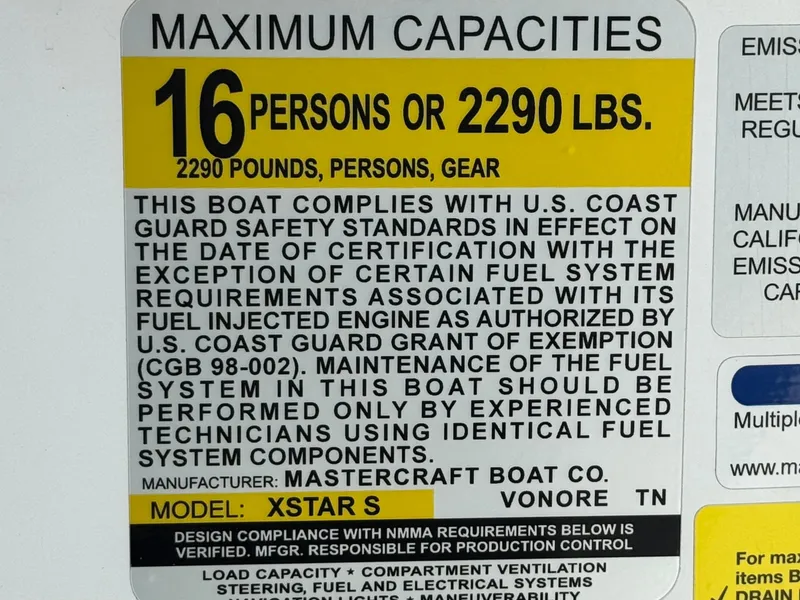 Slide: The Image of 2022 MasterCraft XStar S capacity label: 16 persons or 2290 lbs, U.S. Coast Guard compliant. - 46