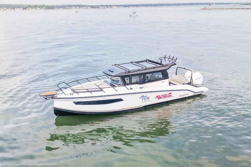 The Image of 2025 Navan C30 boat on calm water, featuring sleek design and modern amenities. - 0