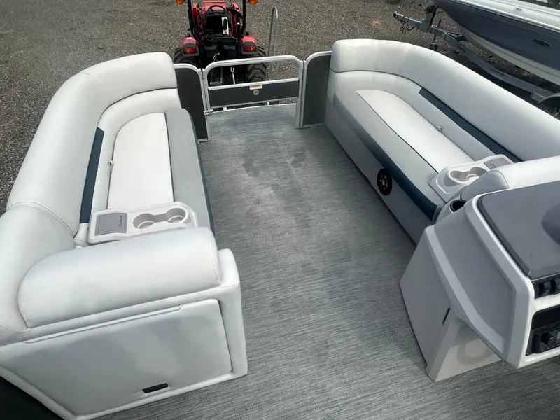 Slide: The Image of Interior of 2022 Godfrey SWEETWATER 2286 SB pontoon boat with spacious seating and cup holders. - 15