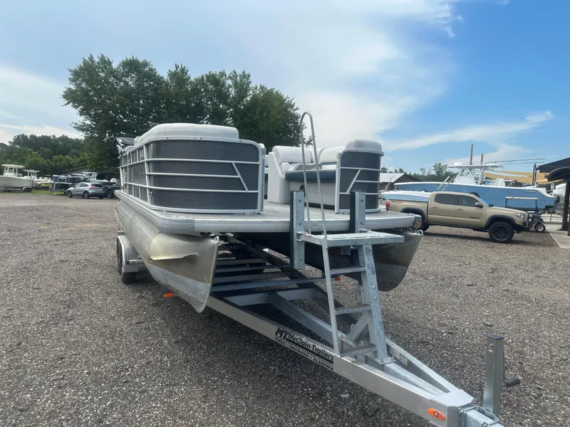 Slide: The Image of 2022 Godfrey SWEETWATER 2286 SB pontoon boat on trailer in outdoor lot. - 8