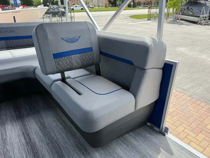 Slide: The Image of 2026 Bennington 22 MSB boat interior with gray and blue seating. - 12