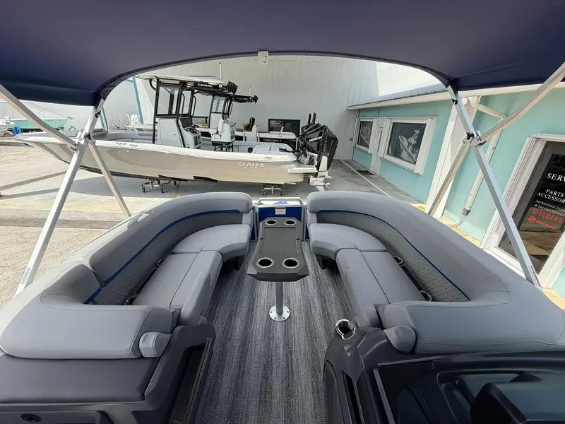 Slide: The Image of 2026 Bennington 22 MSB pontoon boat interior with gray seating and table. - 20