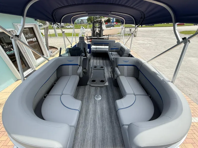 Slide: The Image of 2026 Bennington 22 MSB pontoon boat interior with spacious seating and canopy. - 21