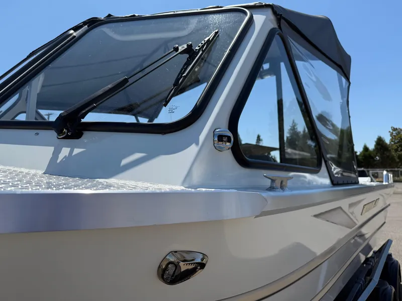 Slide: The Image of 2025 Thunder Jet 210 Luxor boat with sleek design and windshield wipers. - 32