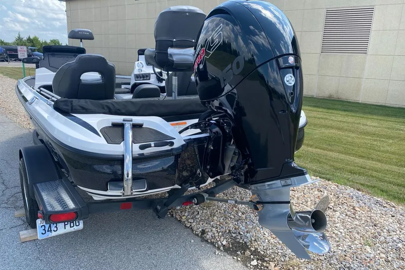 Slide: The Image of 2021 Nitro Z18 Pro boat with powerful outboard motor on trailer. - 2