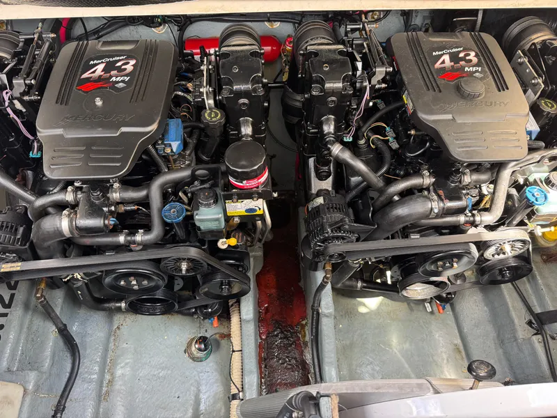 Slide: The Image of Twin MerCruiser 4.3 MPI engines in a 2003 Sea Ray 280 Sundancer boat. - 19