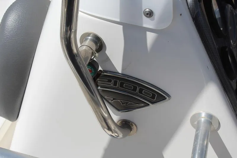 Slide: The Image of Close-up of 2015 Tidewater Bay Max 2100 boat emblem and railing. - 15
