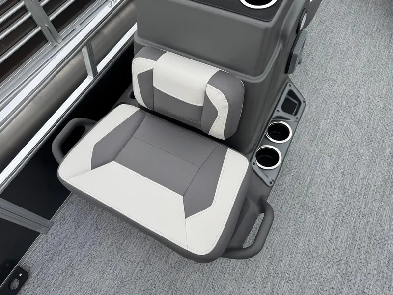 Slide: The Image of 2026 Sun Tracker Bass Buggy 16 XL boat seat with cup holders and gray upholstery. - 10