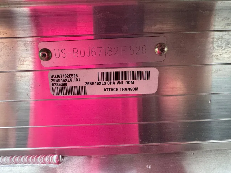 Slide: The Image of 2026 Sun Tracker Bass Buggy 16 XL identification plate with serial number and barcode. - 6
