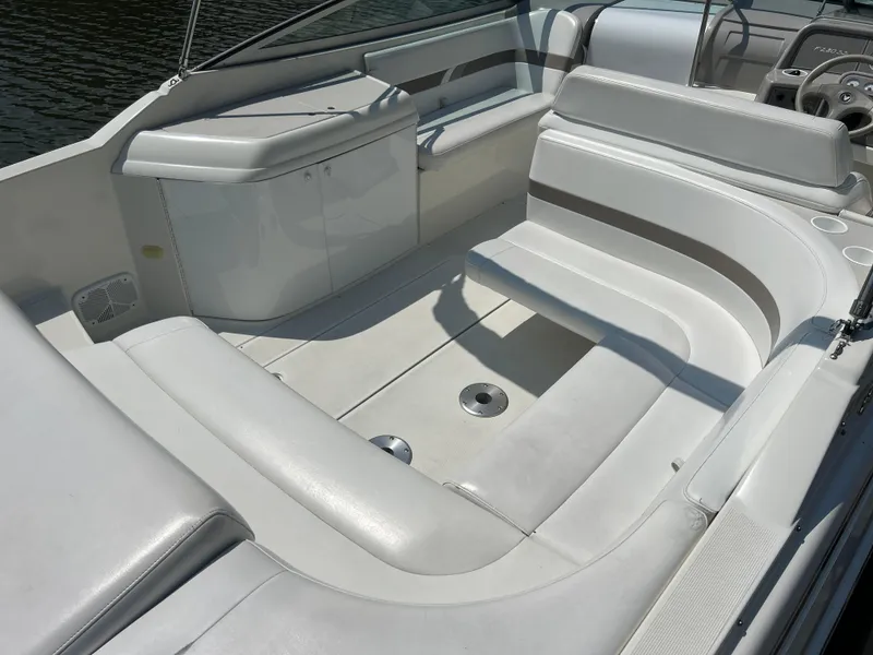 Slide: The Image of 2001 Formula 280 Sun Sport boat interior with white seating and sleek design. - 10