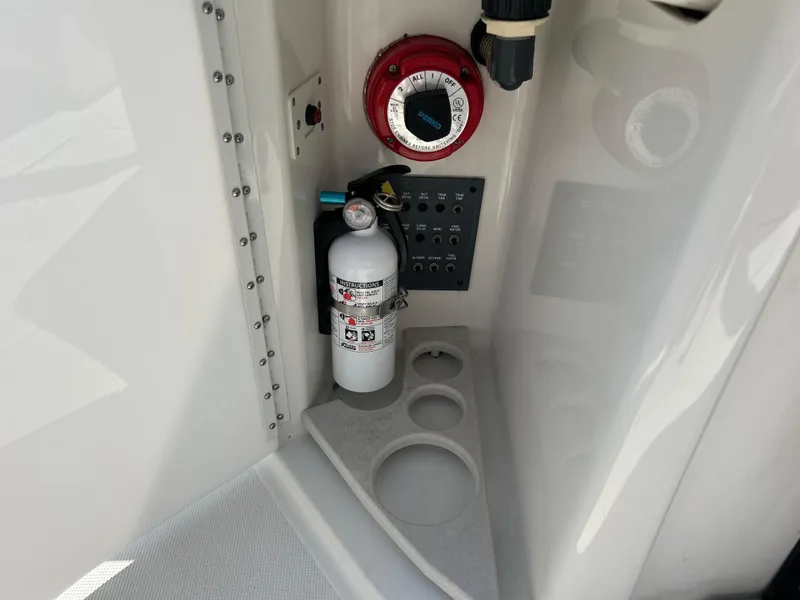 Slide: The Image of Control panel and fire extinguisher on 2001 Formula 280 Sun Sport boat. - 22