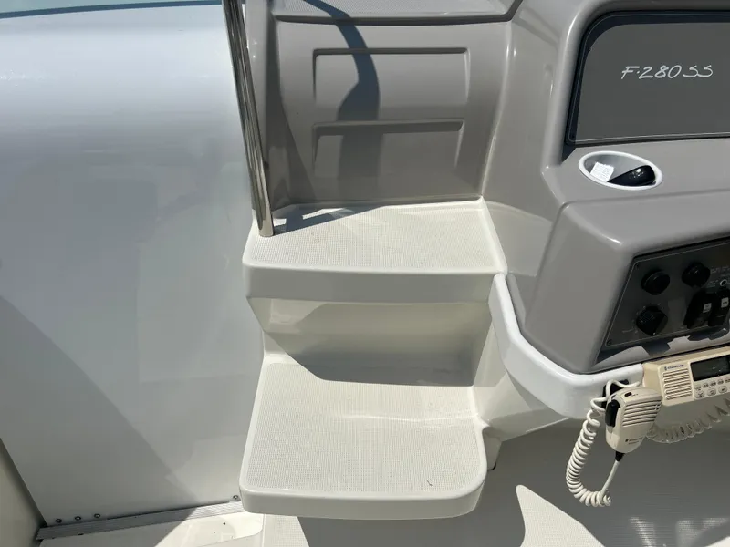 Slide: The Image of 2001 Formula 280 Sun Sport boat steps and control panel detail. - 28