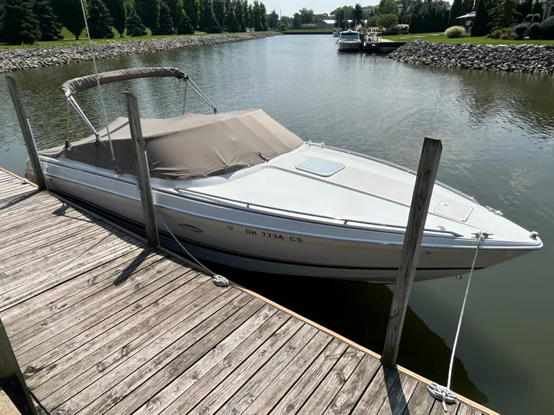 Slide: The Image of 2001 Formula 280 Sun Sport boat docked on a calm river. - 3