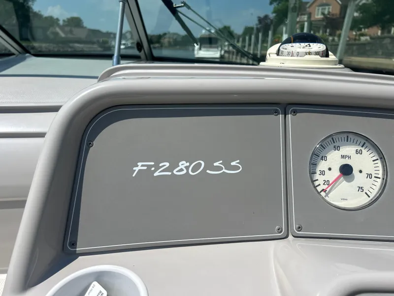 Slide: The Image of Dashboard of a 2001 Formula 280 Sun Sport boat with speedometer and compass. - 31