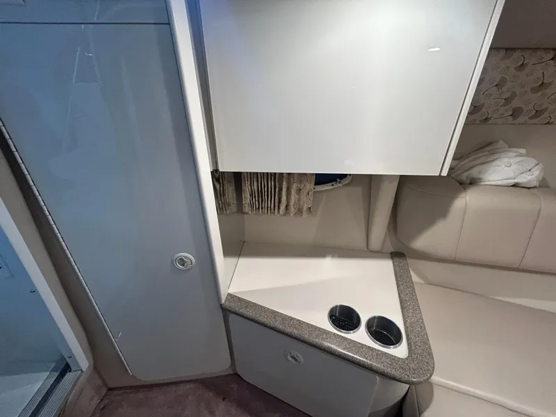 Slide: The Image of Interior of 2001 Formula 280 Sun Sport boat with seating and storage area. - 41