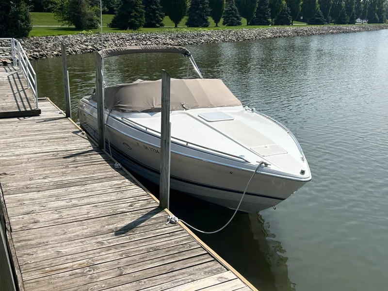 Slide: The Image of 2001 Formula 280 Sun Sport boat docked on a calm lake. - 7