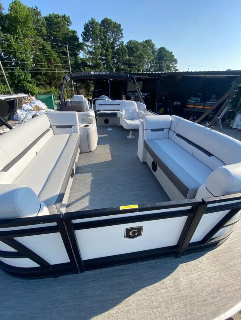 Slide: The Image of 2024 Godfrey SWEETWATER 2286 SFL pontoon boat with spacious seating and modern design. - 3