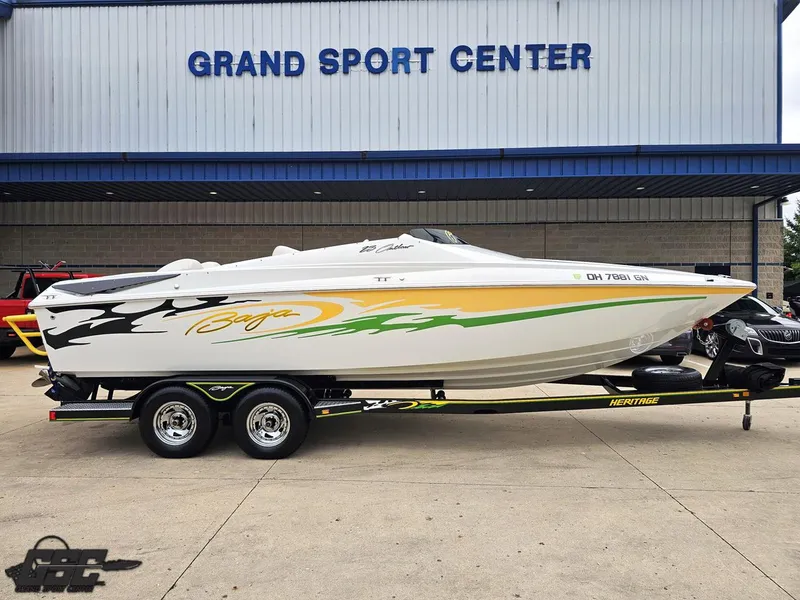 Slide: The Image of 2005 Baja 23 Outlaw speedboat on trailer at Grand Sport Center. - 3