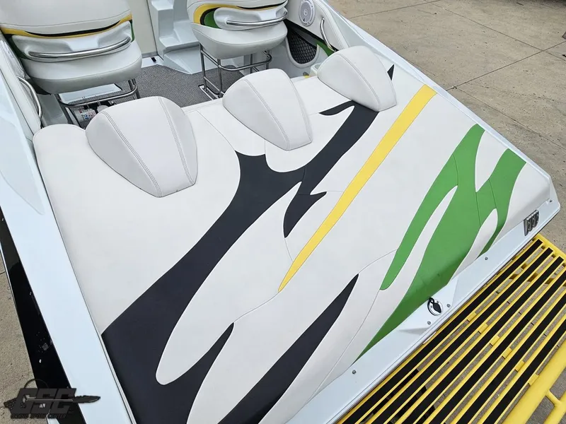 Slide: The Image of 2005 Baja 23 Outlaw boat interior with colorful seat design and modern upholstery. - 43