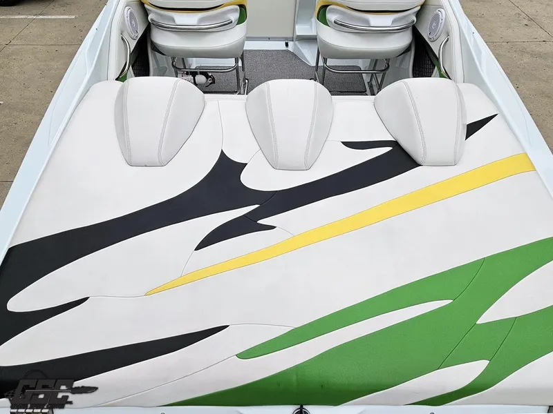 Slide: The Image of 2005 Baja 23 Outlaw boat interior with colorful seat design. - 45