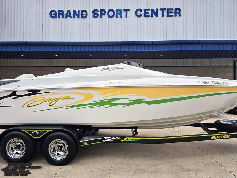 Slide: The Image of 2005 Baja 23 Outlaw boat on trailer at Grand Sport Center. - 5