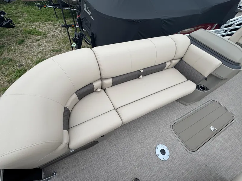 Slide: The Image of Luxurious seating on 2025 Sun Tracker SportFish 22 XP3 pontoon boat, featuring beige upholstery. - 7