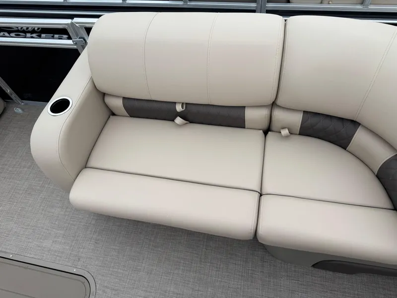 Slide: The Image of 2025 Sun Tracker SportFish 22 XP3 boat seating with cup holder, beige upholstery. - 8