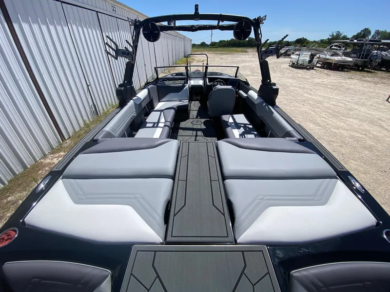 Slide: The Image of 2025 ATX Surf Boats 24 Type-S interior with sleek seating and modern design. - 8