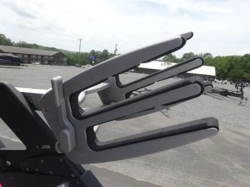 Slide: The Image of 2018 Malibu 23 LSV wakeboard rack in a parking lot setting. - 15