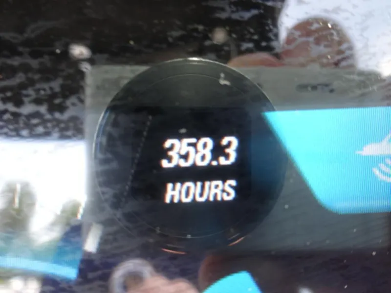 Slide: The Image of Dashboard display showing 358.3 hours on a 2018 Malibu 23 LSV. - 17