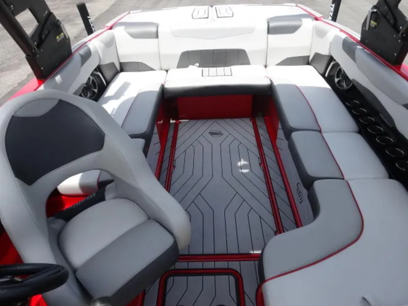 Slide: The Image of Interior of 2018 Malibu 23 LSV boat with gray and red seating. - 8