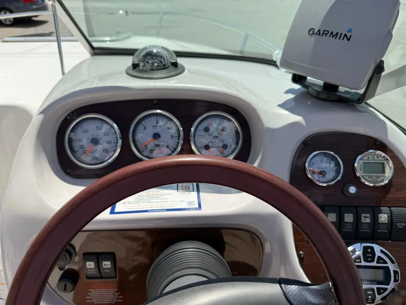 Slide: The Image of Dashboard of a 2007 Chaparral 215 SSi boat with Garmin navigation system. - 12