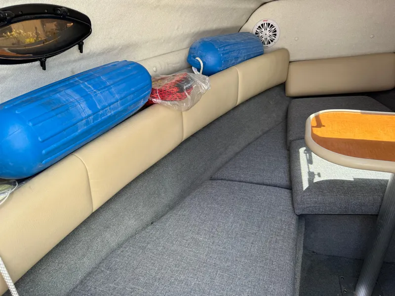 Slide: The Image of Interior of 2007 Chaparral 215 SSi boat with seating and table. - 21