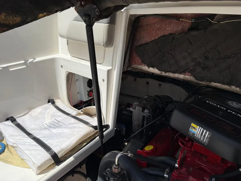 Slide: The Image of Engine compartment of a 2007 Chaparral 215 SSi boat with Volvo Penta engine. - 26