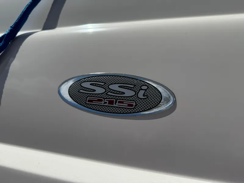 Slide: The Image of 2007 Chaparral 215 SSi emblem on boat exterior, featuring sleek design and branding. - 6