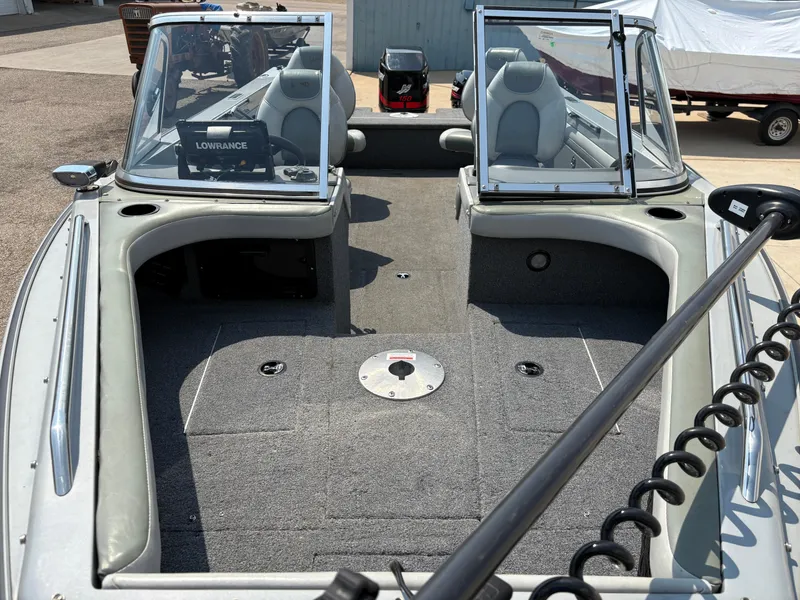 Slide: The Image of 2001 Lund 1950 Tyee Magnum GS ITS boat interior with seating and navigation equipment. - 11