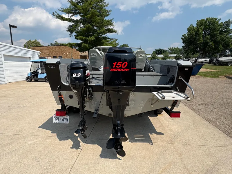 Slide: The Image of 2001 Lund 1950 Tyee Magnum GS ITS boat with Mercury 150 and 9.9 engines. - 3
