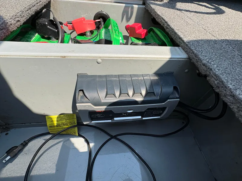 Slide: The Image of Battery compartment of a 2001 Lund 1950 Tyee Magnum GS ITS boat. - 33