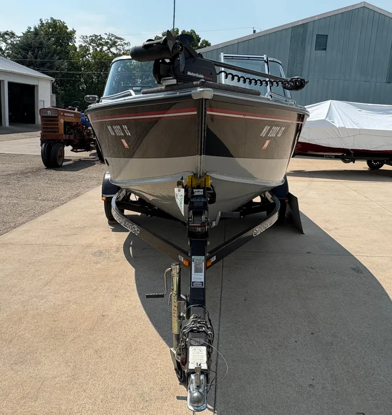 Slide: The Image of 2001 Lund 1950 Tyee Magnum GS ITS boat on trailer in outdoor setting. - 7