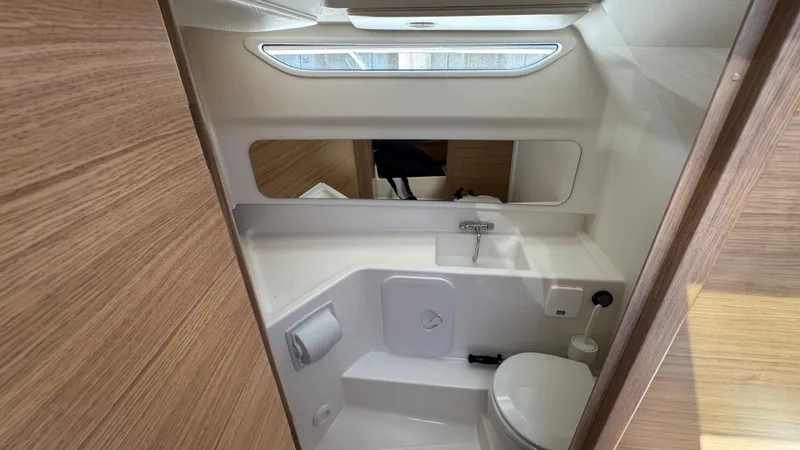 Slide: The Image of Modern bathroom interior in 2025 Nimbus T9 boat, featuring sleek design and compact amenities. - 32