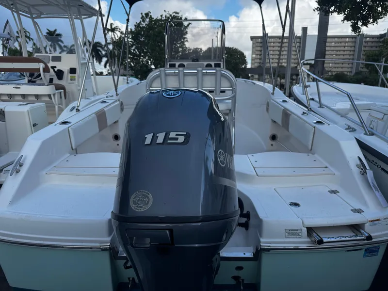 Slide: The Image of 2018 Robalo R180 Center Console with Yamaha outboard motor at dock. - 28