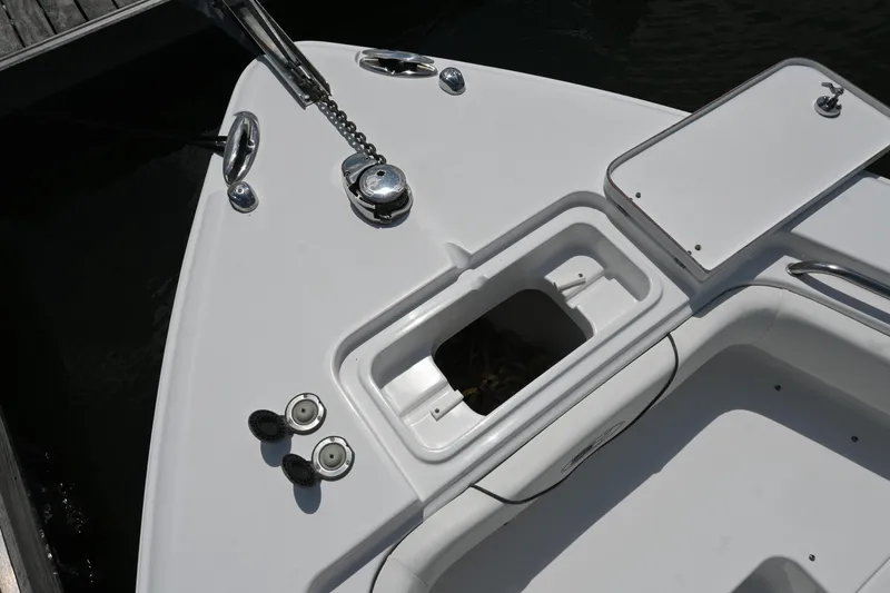 Slide: The Image of Bow area of 2013 Sea Hunt Gamefish 27 boat with anchor storage. - 20