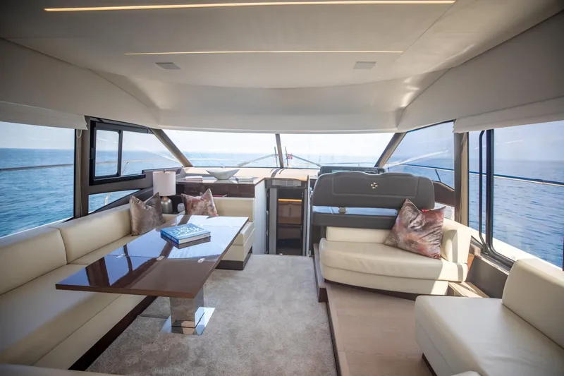Slide: The Image of Luxurious interior of 2020 Prestige 590 Flybridge Cruiser with ocean view. - 29