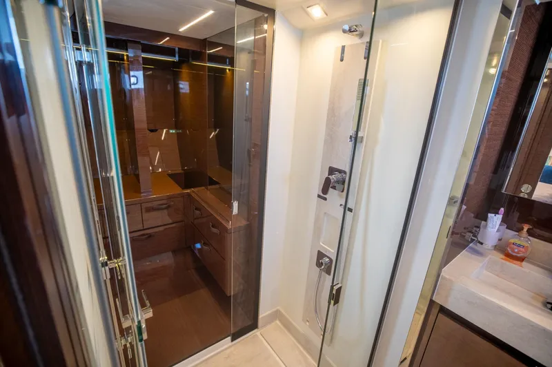 Slide: The Image of Luxurious bathroom interior of 2020 Prestige 590 Flybridge Cruiser yacht with modern shower. - 40
