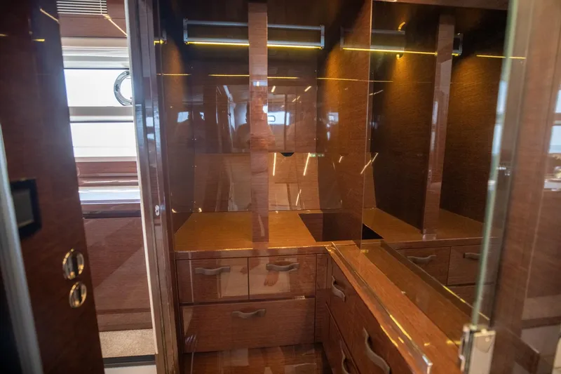Slide: The Image of Luxurious wooden interior of 2020 Prestige 590 Flybridge Cruiser yacht. - 42