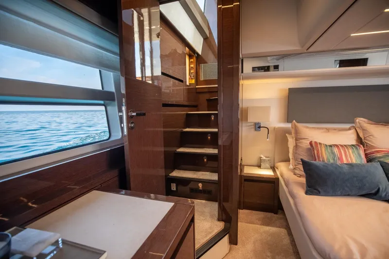Slide: The Image of Luxurious interior of 2020 Prestige 590 Flybridge Cruiser with ocean view. - 46