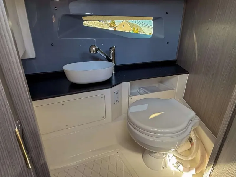 Slide: The Image of Modern bathroom in 2025 Navan S30 with sleek sink and compact toilet design. - 13