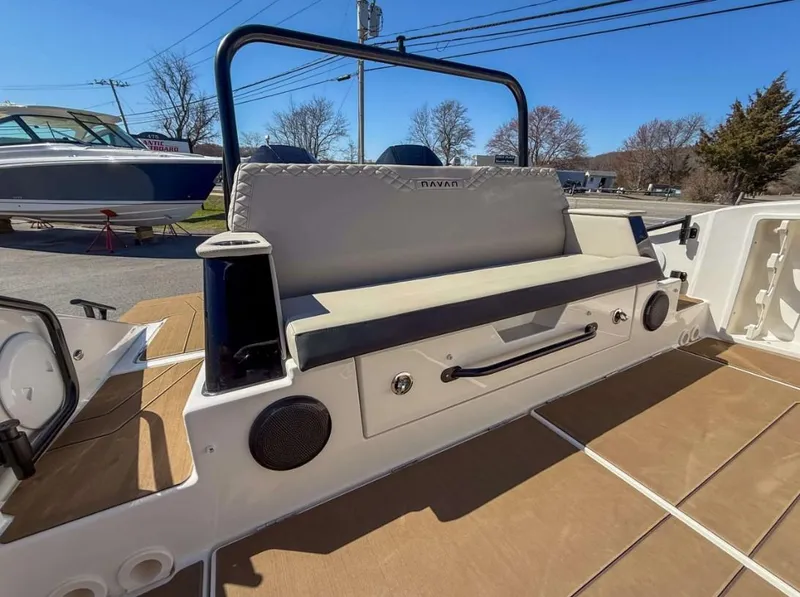 Slide: The Image of 2025 Navan S30 boat interior with cushioned seating and modern design elements. - 19